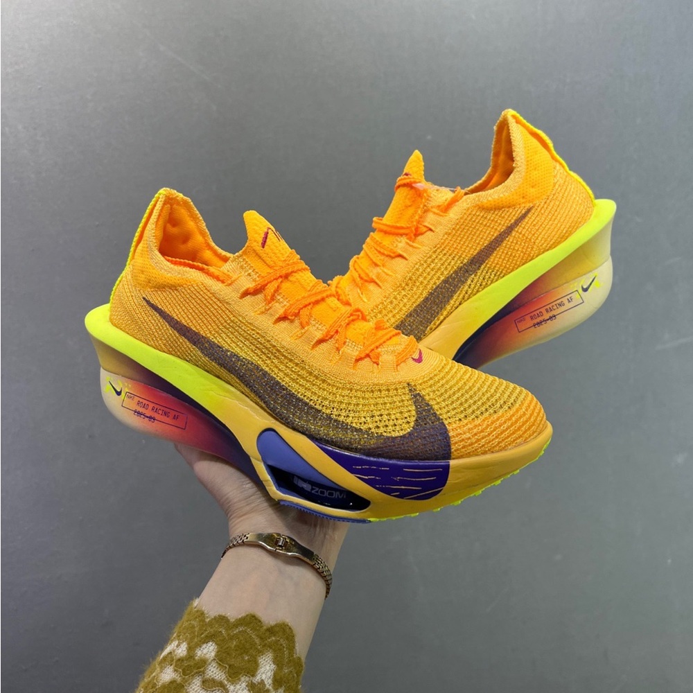 Nike Women's Orange & Yellow Flyknit Zoom Running Shoes